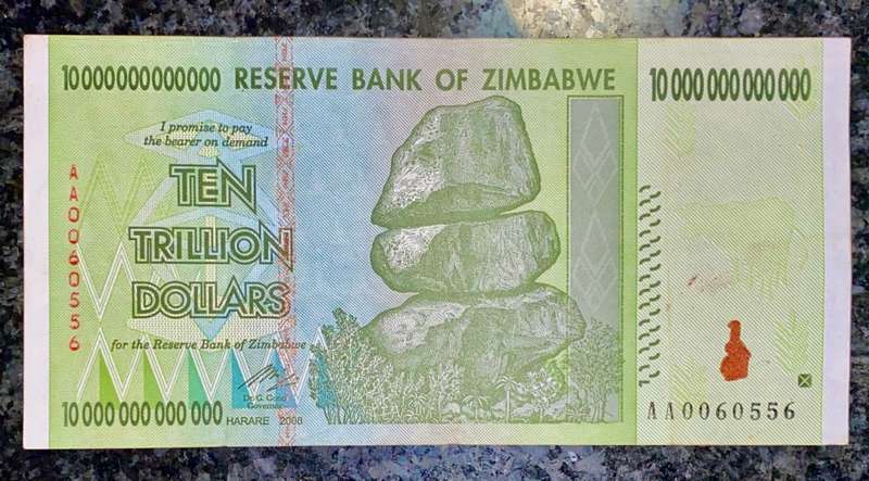 ZIMBABWE 10 TRILLION DOLLARS LOW NUMBER AA0060556 AUNC HARARE 2008 ZIM BIRD WTM