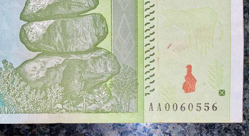 ZIMBABWE 10 TRILLION DOLLARS LOW NUMBER AA0060556 AUNC HARARE 2008 ZIM BIRD WTM