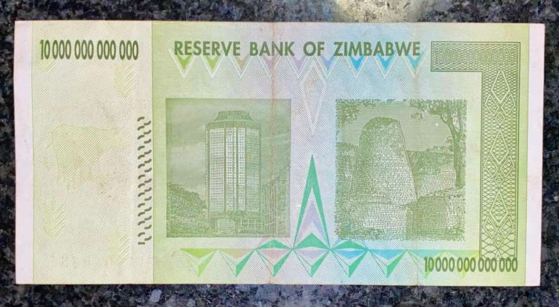 ZIMBABWE 10 TRILLION DOLLARS LOW NUMBER AA0060556 AUNC HARARE 2008 ZIM BIRD WTM