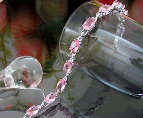 LOVELY 18K WGP PINK SAPPHIRE TENNIS BRACELET