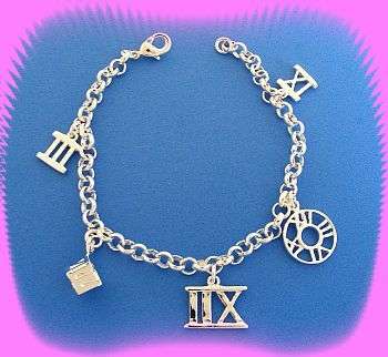 STERLING SILVER CHARM BRACELET