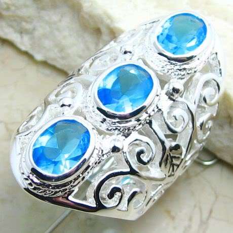 SIZE: 6 - STERLING SILVER & SWISS BLUE TOPAZ RING