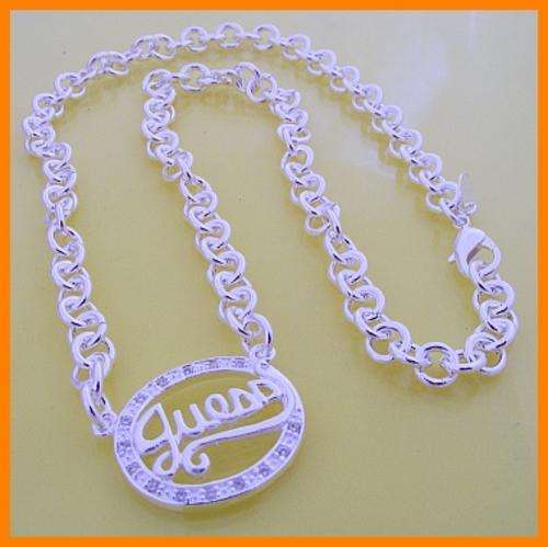 SILVER GUESS PENDANT