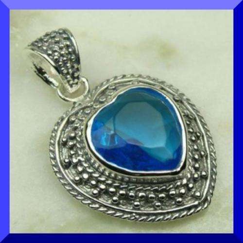 925 STERLING SILVER & BLUE TOPAZ PENDANT