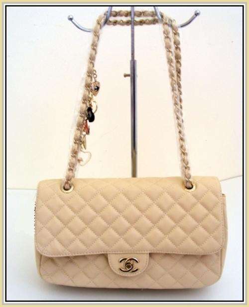 TRULY ELEGANT AND STYLISH CREAM DESIGNER HANDBAG