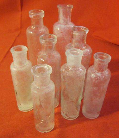 Collection of 8 Vintage miniature Clear Glass Bottles