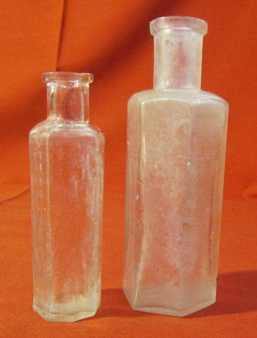 Collection of 2 old Hexagonal miniature Clear glass Bottles