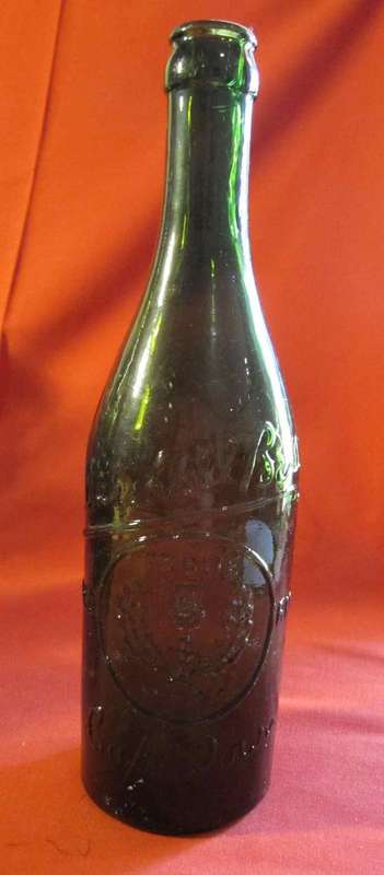 Brown Pressed Glass Bottle with Trade Mark on side - "Marshall Bros. Cape Town"