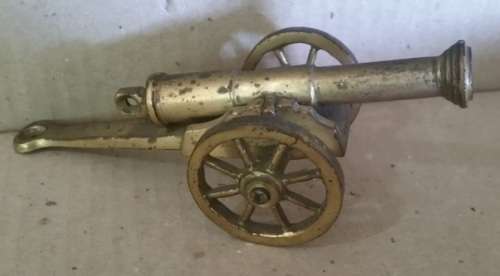 UNIQUE & RARE has on offer a Brass Cannon - Barrel & Wheels Move - Collectors Dream - Needs a polish