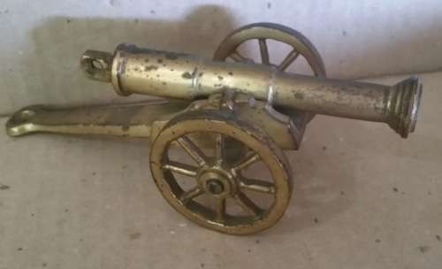 UNIQUE & RARE has on offer a Brass Cannon - Barrel & Wheels Move - Collectors Dream - Needs a polish
