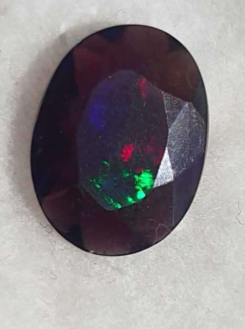 "ULTRA RARE" Untreated 1.21ct Natural Faceted BLACK OPAL with Play of Colour - READ BELOW