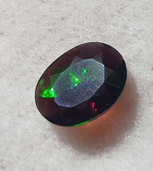 "ULTRA RARE" Untreated 1.21ct Natural Faceted BLACK OPAL with Play of Colour - READ BELOW