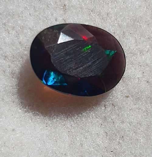 "ULTRA RARE" Untreated 1.21ct Natural Faceted BLACK OPAL with Play of Colour - READ BELOW