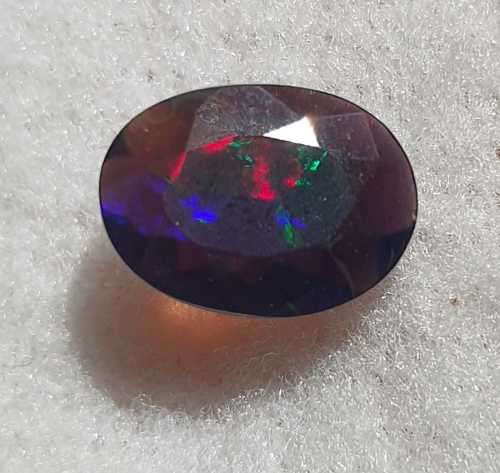"ULTRA RARE" Untreated 1.21ct Natural Faceted BLACK OPAL with Play of Colour - READ BELOW
