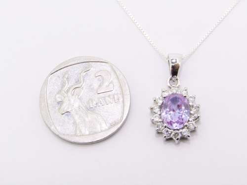 An Elegant Lilac Zirconia Pendant on Chain in Sterling Silver.