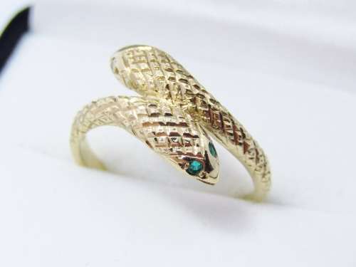 Antique design 9 carat gold ring with a double snake head
