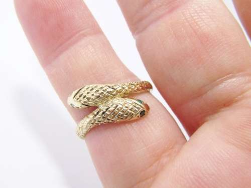 Antique design 9 carat gold ring with a double snake head
