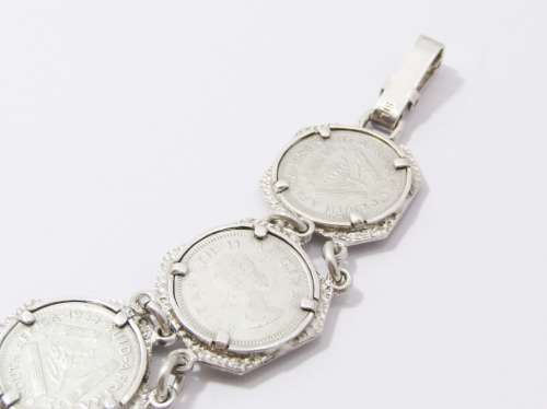 A Lovely Tickey Bracelet In Sterling Silver.
