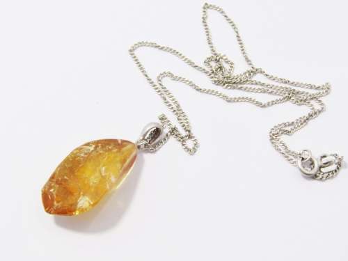 A Beautiful Natural Citrine Rough Facet Gemstone Pendant on Chain in Sterling Silver.