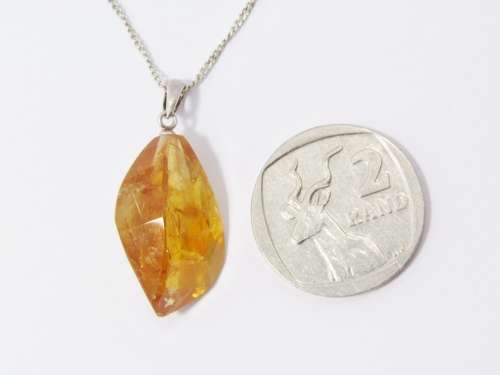 A Beautiful Natural Citrine Rough Facet Gemstone Pendant on Chain in Sterling Silver.