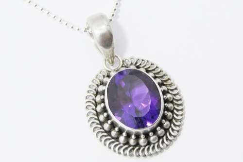 A Gorgeous Oval Amethyst Pendant On Chain in Sterling Silver.