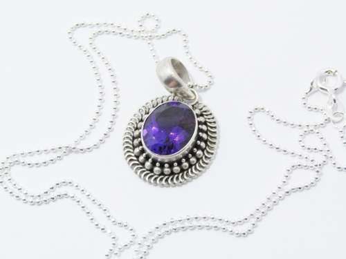 A Gorgeous Oval Amethyst Pendant On Chain in Sterling Silver.