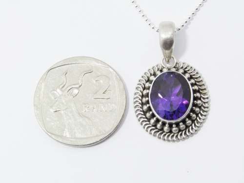 A Gorgeous Oval Amethyst Pendant On Chain in Sterling Silver.