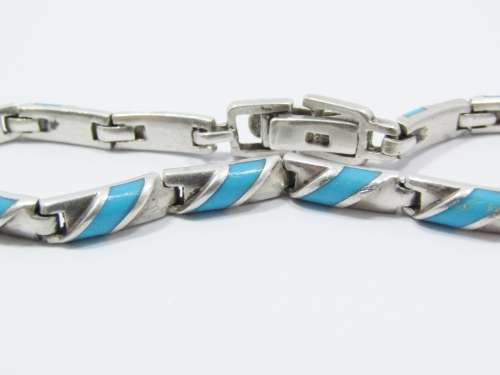 Paneled Bracelet With a Turquoise Inlay in Sterling Silver