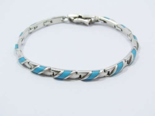 Paneled Bracelet With a Turquoise Inlay in Sterling Silver