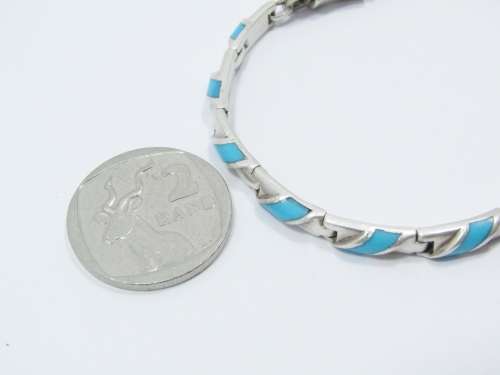 Paneled Bracelet With a Turquoise Inlay in Sterling Silver