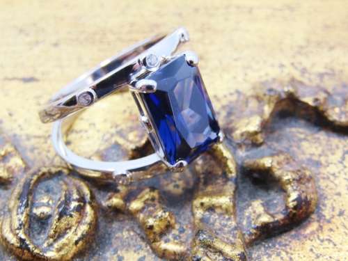 A Beautiful Double Row Into One Band Blue  Zirconia Ring in Sterling Silver.
