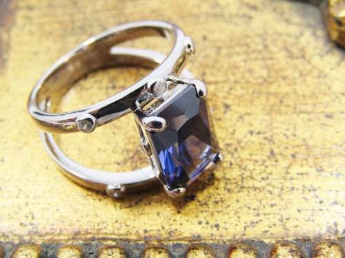 A Beautiful Double Row Into One Band Blue  Zirconia Ring in Sterling Silver.