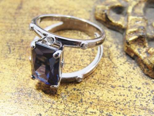 A Beautiful Double Row Into One Band Blue  Zirconia Ring in Sterling Silver.