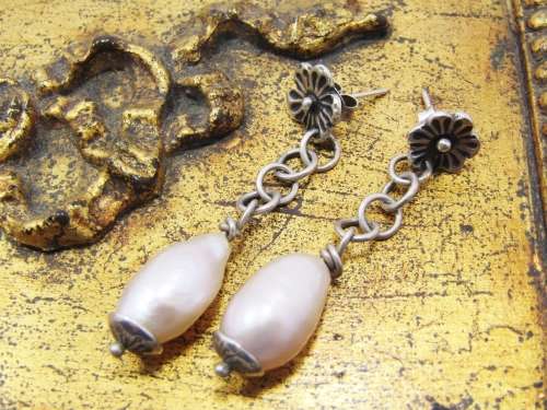 Amazing Freshwater Pearl Drop Earrings With a Flower Detail in Sterling Silver