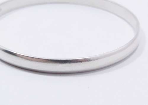 A Lovely Solid  Silver Bangle in Sterling Silver.