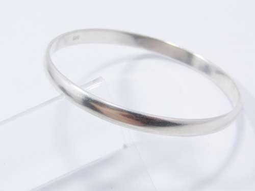 A Lovely Solid  Silver Bangle in Sterling Silver.