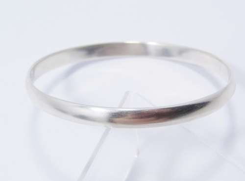 A Lovely Solid  Silver Bangle in Sterling Silver.