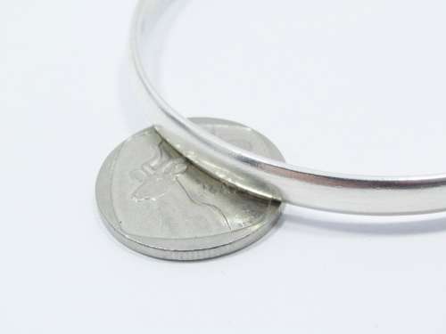 A Lovely Solid  Silver Bangle in Sterling Silver.