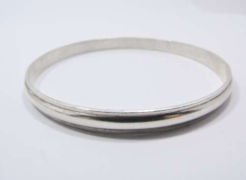 A Gorgeous Solid Ribbed Design Bangle in Sterling Silver.