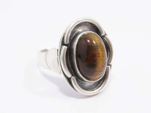 A Lovely Vintage Modernist  Design Ring With a Tigers Eye Stone in Sterling Silver.