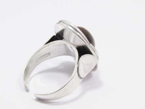A Lovely Vintage Modernist  Design Ring With a Tigers Eye Stone in Sterling Silver.