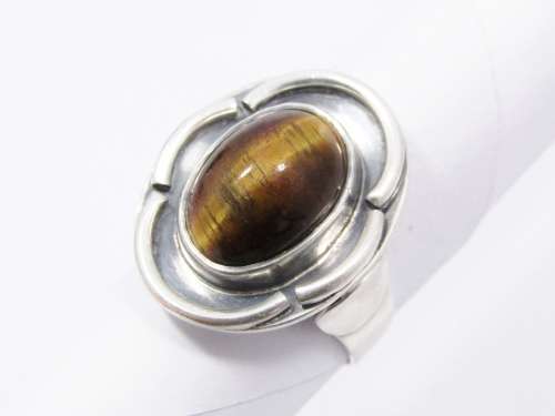 A Lovely Vintage Modernist  Design Ring With a Tigers Eye Stone in Sterling Silver.