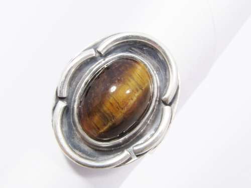 A Lovely Vintage Modernist  Design Ring With a Tigers Eye Stone in Sterling Silver.