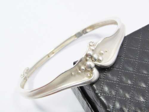 A Beautiful Abstract  Design Hinged Bangle in Sterling Silver