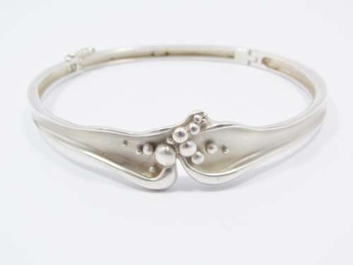 A Beautiful Abstract  Design Hinged Bangle in Sterling Silver