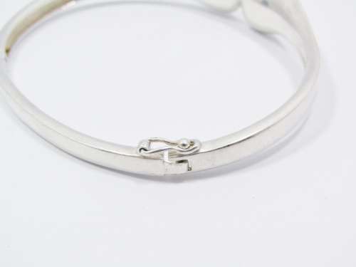 A Beautiful Abstract  Design Hinged Bangle in Sterling Silver