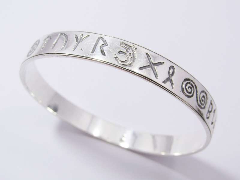A Stunning Rustic Runic Design Bangle in Sterling Silver.