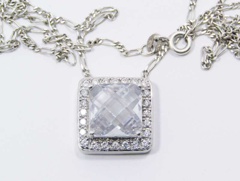 A Lovely Square Zirconia Pendant On Chain in Sterling Silver.