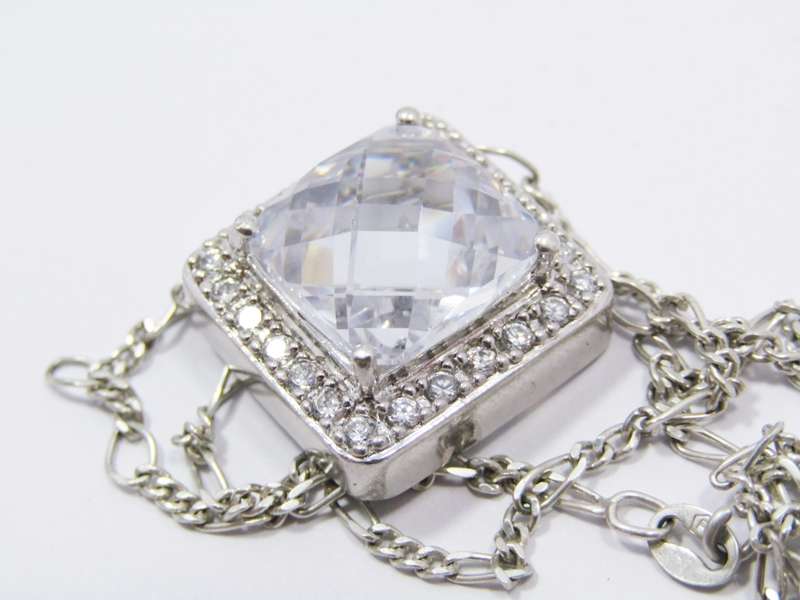 A Lovely Square Zirconia Pendant On Chain in Sterling Silver.
