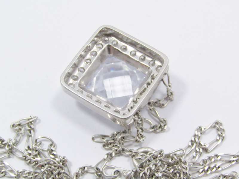 A Lovely Square Zirconia Pendant On Chain in Sterling Silver.